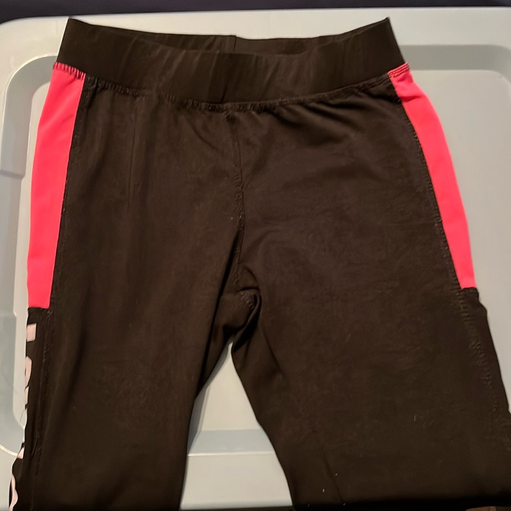 Size medium joggers. Real comfy. Pink and black